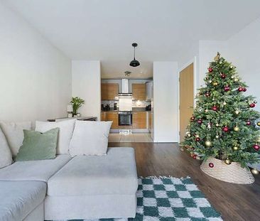 Stunning 2-bedroom apartment located on the upper floor of this dev... - Photo 1