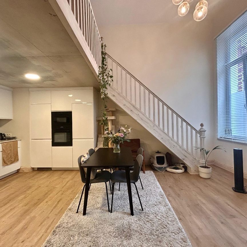Uniek 1‑slpk appartement met vide - Photo 1