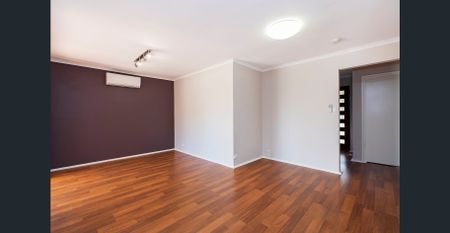 LOVELY THREE-BEDROOM HOME IN A GREAT LOCATION! - Photo 4