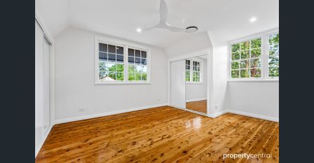 Move-In Ready Modern Family Home with Backyard in Peaceful Blaxland Location - Photo 5