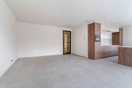 Hoogwaardig afgewerkt nieuwbouw appartement met 2 slaapkamers, terras en carport - Photo 2
