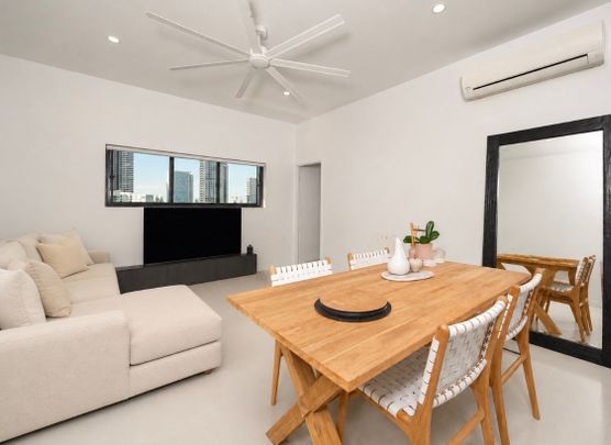 TOP FLOOR LIVING WITH WATER & SKYLINE VIEWS - Photo 1