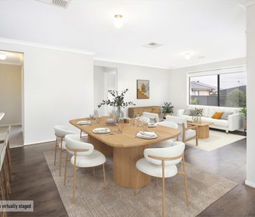 GENEROUSLY SIZED FAMILY HOME WITH DUAL LIVING ZONES & STUDY - Photo 2