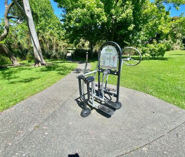 Elevated, Secure Living by the Park - Photo 3