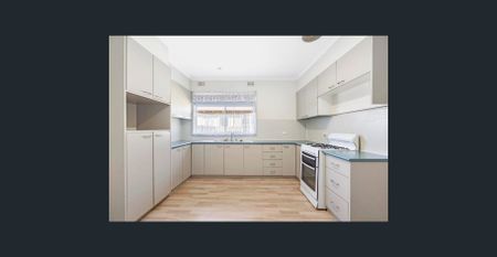 Low Maintenance Living with Brand New Bathroom - Photo 2