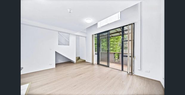 Quiet One-Bedroom Apartment with Great Natural Light - Photo 1