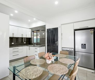 MODERN FAMILY HOME WITH WATER INCLUDED! - Photo 6