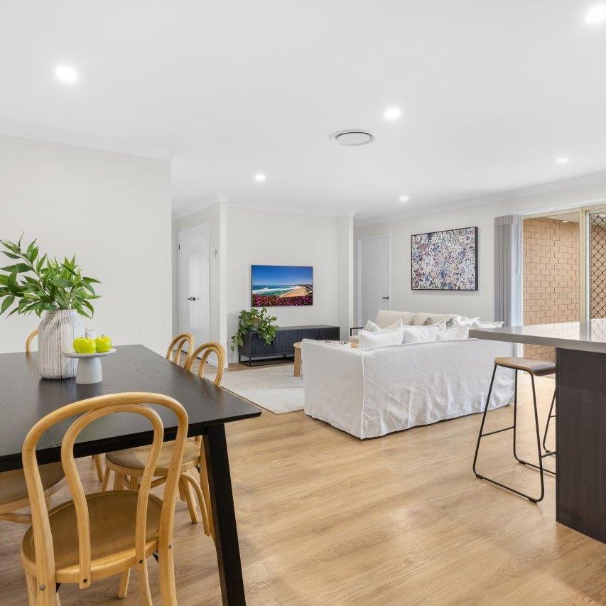 8 Harcourt Parade, Macquarie Hills NSW 2285 - House For Rent | Domain - Photo 1