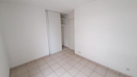 location Appartement T3 DE 65.63m² À LA RICHE - Photo 2