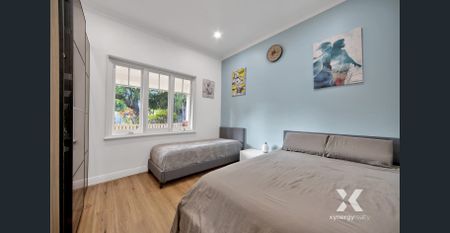 Spacious 3-Bedroom Home with Modern Amenities in Prime Location - Photo 4