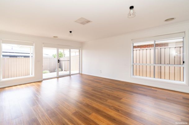 LOW MAINTENANCE LIVING IN A SOUGHT AFTER LOCATION - Photo 1