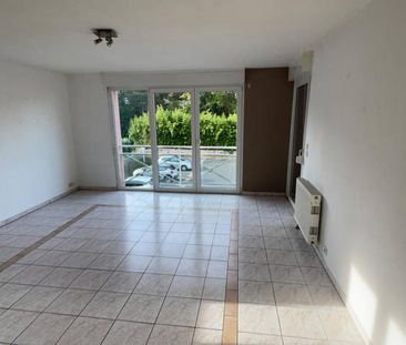 Appartement - proche centre-ville - parking et balcon - Photo 1