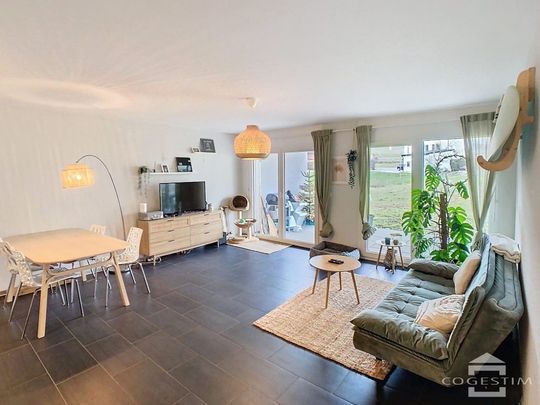 Appartement de 2.5 pièces au rez-de-chaussée - Foto 1