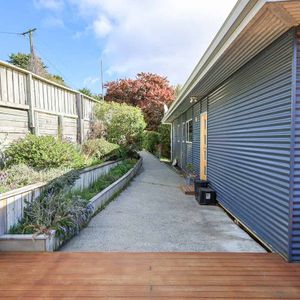 Modern, Sunny 4-Bedroom Home with Stunning Views! - Photo 3