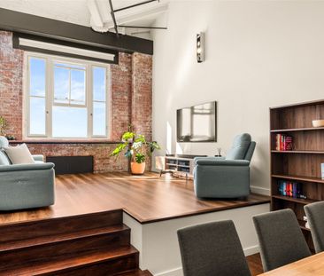 Character-Filled Three-Bedroom Warehouse Apartment with River Views - Photo 1