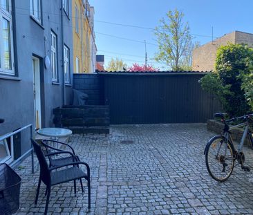 Lys og hyggelig 2-værelses med charmerende gårdhave – beliggende i ... - Photo 5