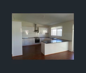 MODERN SPLIT-LEVEL LIVING WITH A BEAUTIFUL OUTLOOK - Photo 2