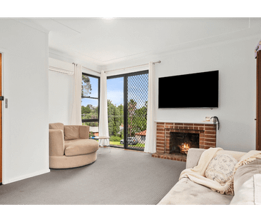 Spacious Three-Bedroom Home with Multiple Living Areas - Photo 1