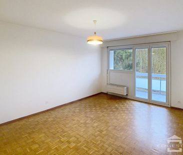 Dans un cadre verdoyant, 2.5pces au 1er étage - Photo 2