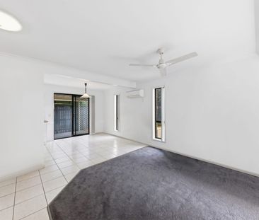 Neat & Tidy Unit in Unbeatable Beachside Location - Photo 1