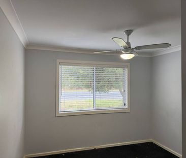 Coastal Convenience Meets Comfortable Living - Photo 2