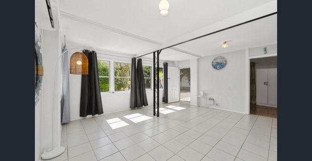 Coastal Living at Its Best – 2-Bedroom Unit Just Minutes from the Beach! - Photo 1