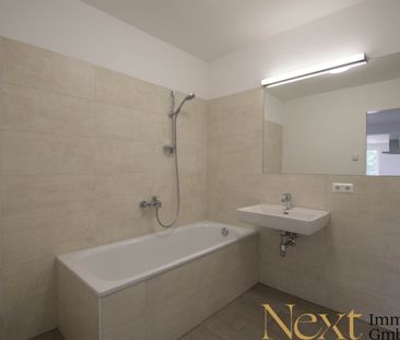 Lichtdurchflutete 2-Zimmer-Wohnung mit voll ausgestatteter Küche in... - Foto 1