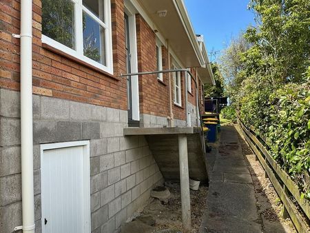 Charming 2BR Unit with Garden & Deck! - Photo 3