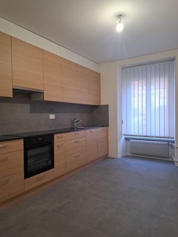 Bel appartement de 3 pièces au rez-de-chaussée surélevé au Locle - Photo 2