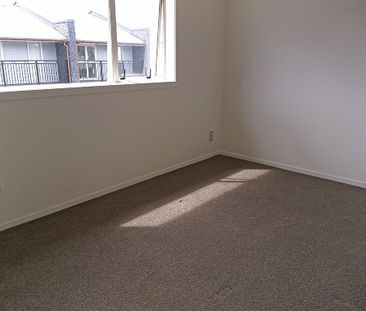 Townhouse Living in fully gated complex with 2 carparks - Photo 3