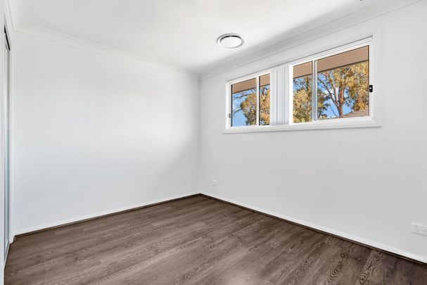 "BRAND NEW TOWNHOUSE - NEXT TO TRAIN STATION" - Photo 1