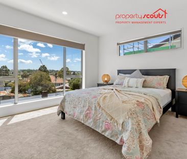 Spacious Designer Home with Flexible Living Across Three Levels - Photo 1