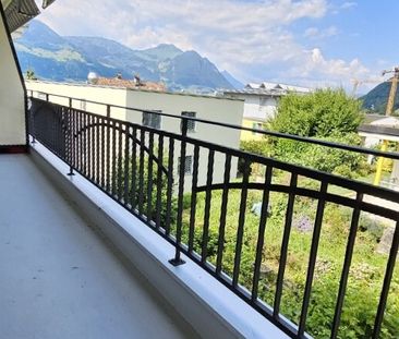 Wohnung mit Weitsicht auf umliegende Berge und Seeblick - Foto 1