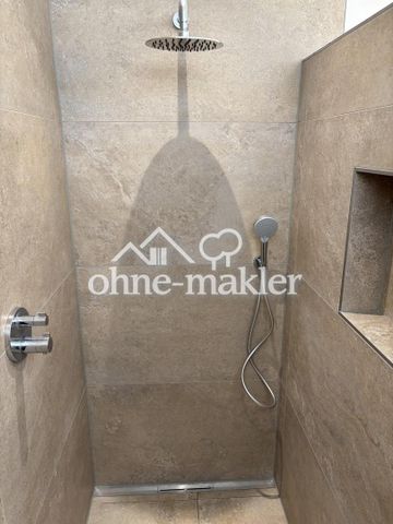 Exklusive Neubauwohnung im Erdgeschoss mit Garten - Photo 4