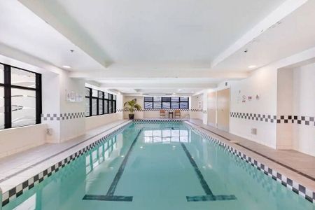 Central Apartment with Carpark, Pool & Gym - Photo 4