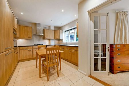 A well-maintained family home full of period features with mature rear garden and driveway parking for one car. - Photo 3