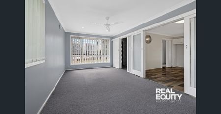 Family Residence with a Fresh Interior - Photo 2