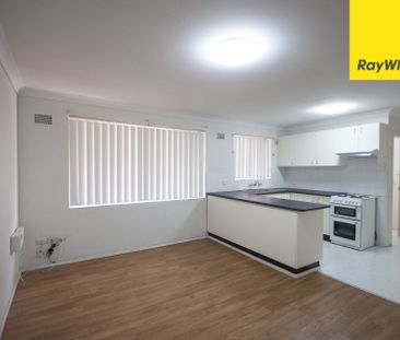 TWO BEDROOM UNIT IN CENTRAL LOCATION - Photo 1