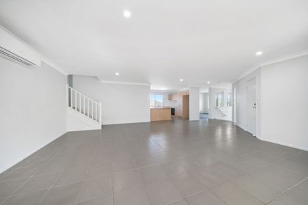 Elevated Four Bedroom Family Home with Large Backyard - Photo 3