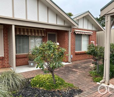Open the Door To Light-Filled Living in a Peaceful Parkside Setting - Photo 2