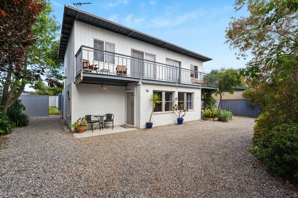 Coastal Living at Its Best – 2-Bedroom Unit Just Minutes from the Beach! - Photo 1