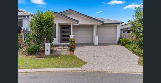 Rent Now! Ideal 4-BR Home with Tiled Living Areas & Lock-Up Garage! - Photo 1