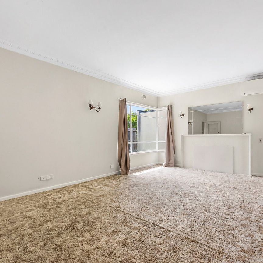 Immaculate Three-Bedroom Home in the Highly Desirable McKinnon School Zone - Photo 1