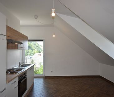 "GRÖDIG - Moderne und gemütliche 2 Zimmer Dachgeschosswohnung" - Foto 1