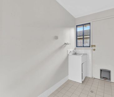 Neat and Tidy Three-Bedroom Home in a Great Location! - Photo 1