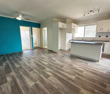 Neat and tidy two bedroom unit located within walking distance to l... - Photo 1