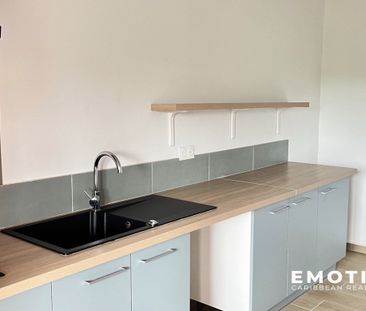Location Appartement 2 pièces 65m² LES ABYMES 97139 - Photo 3