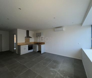 Appartement 2 pièce(s) 32.95 m² - Photo 2