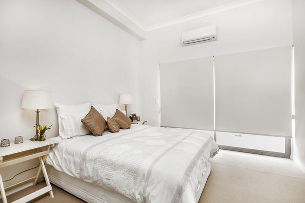 Conveniently Located - Large Two Bedroom Unit Available - Photo 1