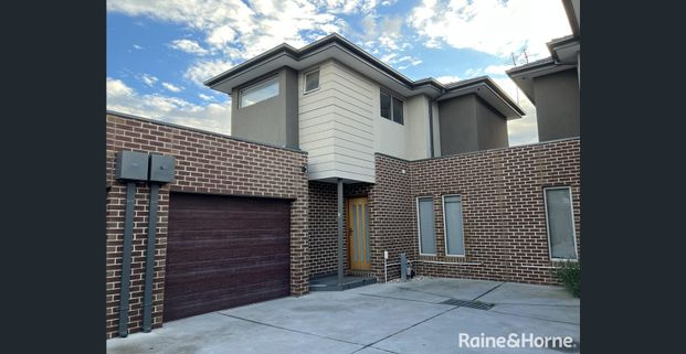 Modern Living in a Thriving Location! - Photo 1